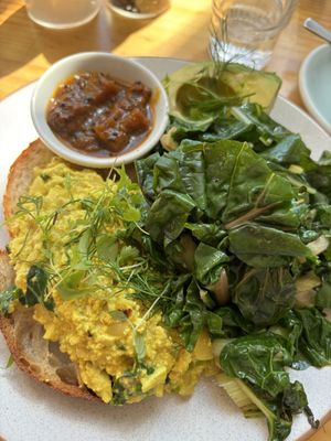Tofu scramble with sautéed veg and avocado   at Momo Wholefood in Newcastle