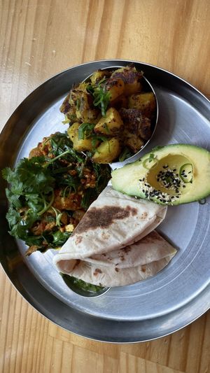 Indian breakfast with avocado - tasty   at Momo Wholefood in Newcastle