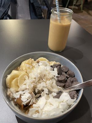 Banana porridge and iced oatmilk latte  at Copenhagen Coffee Lab - Alfama in Lisbon