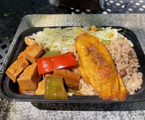Stew chicken with rice and beans and cabbage. Delicious and filling   at Natural Blend in Brooklyn
