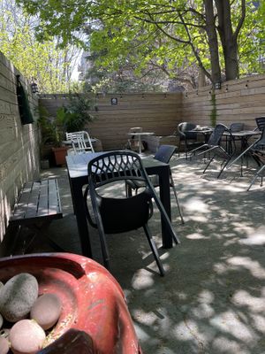 Peaceful outdoor seating in back  at Natural Blend in Brooklyn