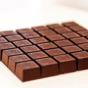 Cointreau cream, What is better than an apéritif? An apéritif like cointreau in a cream filling covered in rich dark Belgian chocolate. You won't be able to stop at just one.
 at Valentino Chocolatier in Dilbeek