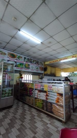 The inside of the restaurant.  They also sell many local vegan packaged food. at Quan An Lạc Vegetarian Food in Quang Nam