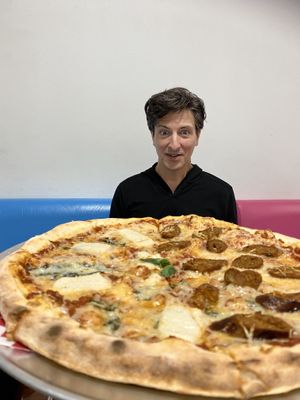 Yummy! Marguerita with sausage on half!!  at Plant Pizza in Cooper City