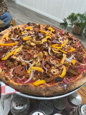 Meatless love with red onions and bell peppers   at Plant Pizza in Cooper City