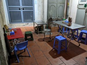 Main seating area at the back of the alleyway at Quán Phở Chay anh Hải in Hanoi