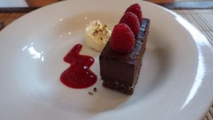 Dark Chocolate and Raspberry Mud Pie with clotted cream and raspberry coulis at The Bean Inn in St Ives
