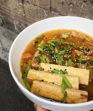 Kimchi vegan shchi with oyster mushrooms, fried tofu, scallion, sesame seeds, and a lot of vegetables at 2022_place - Pop Up in Yerevan