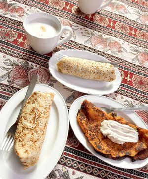 Vegan crepes with sauerkraut, seitan and “cheese” and one spicy kimchi-crepe with cashew sour creme. Divinely delicious and hearty! Collab w/Daner pizza and Letters&Numbers. at 2022_place - Pop Up in Yerevan