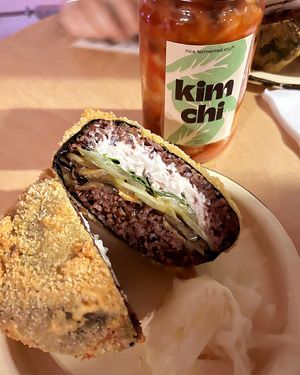 Divine onigirazu and a jar of homemade kimchi. The kimchi is available in 2022_place. at 2022_place - Pop Up in Yerevan