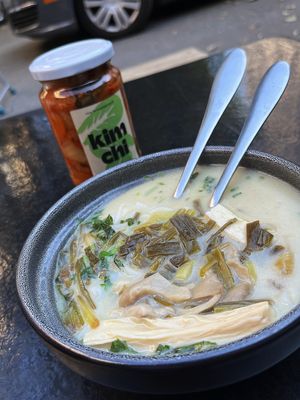 The greatest vegan Tom Kha soup I've ever eaten! And a jar of vegan kimchi made by 2022 place. at 2022_place - Pop Up in Yerevan
