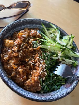 Hot and delicious Mapo tofu silk tofu, brown rice, soy "meat", fresh cucumber and sauces at 2022_place - Pop Up in Yerevan