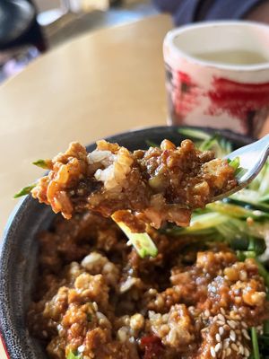 Delicious Mapo tofu with silk tofu, brown rice, soy "meat", fresh cucumber and sauces at 2022_place - Pop Up in Yerevan