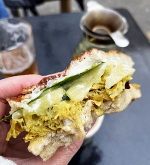 Inner world of Max sandwich with curry "chicken" seitan, aioli, pineapple and lettuce. Soooo hearty and juicy! Highly recommend! at 2022_place - Pop Up in Yerevan