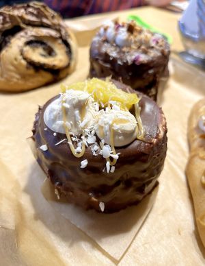 Chocolate brownie with mango, caramel and nuts at 2022_place - Pop Up in Yerevan