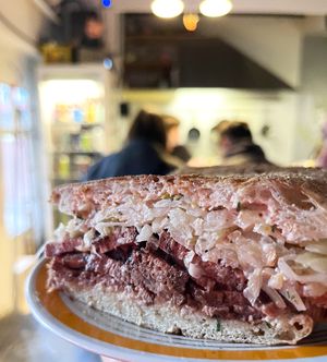 Rouben sandwich with seitan, sauce and sauerkraut. So HUGE and hearty! at 2022_place - Pop Up in Yerevan