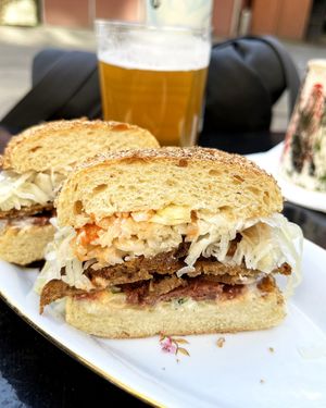 Hearty Ruben sandwich with marinated homemade seitan and sauerkraut at 2022_place - Pop Up in Yerevan