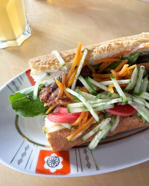 The great Banh mi sandwich: hoisin chick’n seitan tempura, marinated carrot, purple radish, cucumber, marol, sriracha and cashew aioli sauces at 2022_place - Pop Up in Yerevan