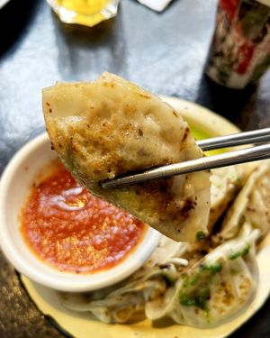 Vegan special gyoza with oyster mushrooms, champignons, tofu cream cheese, tomato sauce and mandak-kimchi amuse-bouche on the side. at 2022_place - Pop Up in Yerevan