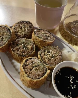 Tempura roll with scrambled tofu with aveluk, baked plums, pickled shushan, cucumber and cashew aioli at 2022_place - Pop Up in Yerevan