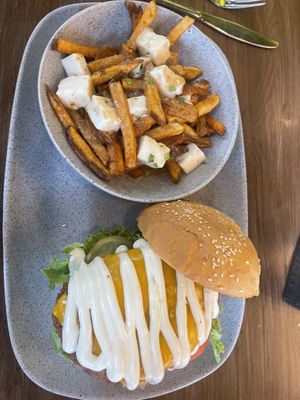 “Chiken sandwich” with potine fries  at The Edgy Vedge in George Town