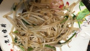 Stir fried bean sprouts is a light and healthy dish, featuring crisp, tender sprouts quickly tossed in a hot wok with simple seasonings to enhance their natural freshness and flavo at Kungfu Kitchen in Reading