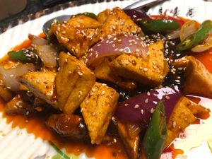 Home-style tofu delivers the signature Sichuan málà kick, with a perfect blend of numbing spice and rich aroma. It's milder than Mapo tofu but still bold and flavorful. 🌶️ at Kungfu Kitchen in Reading