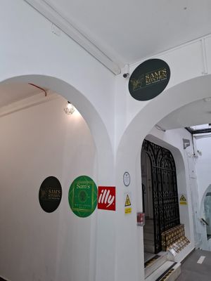 Sign to follow inside the building at Sams Meat Free Deli in 