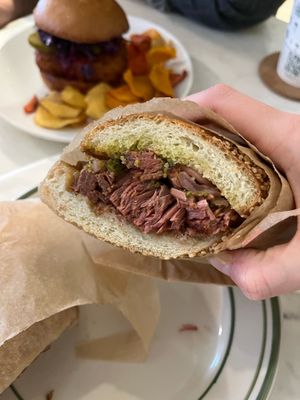 A close-up of THE STEAK SANDWICH. LOOK AT THE TEXTURE!! Unreal. Truly uncanny.  at Garden Carver in Brooklyn