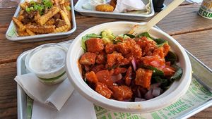 cluckcobb on kale with buffalo chikn and blue cheese. good.  at Next Level Veggie Grill in Denver