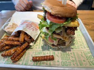 The Animal Stacker with sweet potato fries   at Next Level Veggie Grill in Denver