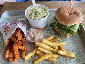 Smash patty, fries and coleslaw   at Next Level Veggie Grill in Denver