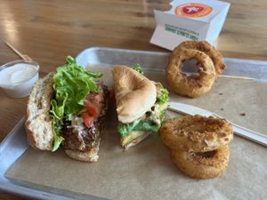 Bacon burger & fire chicken sandwich (chicken was great) onion rings  at Next Level Veggie Grill in Denver