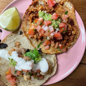 Taco de no pescado y taco de birria  at Gaia Comida Vegana in La Paz
