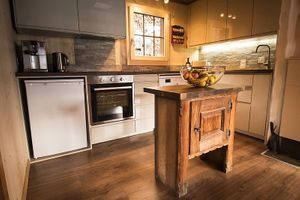 Kitchen in upstairs apartment at Chalet Chez Teddy in Lenk Im Simmental