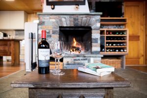 Fireplace in upstairs apartment at Chalet Chez Teddy in Lenk Im Simmental