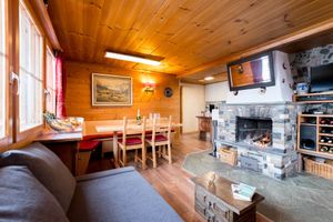 Living room in upstairs apartment at Chalet Chez Teddy in Lenk Im Simmental