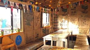 Super chilled and quirky covered seating area in part of their courtyard garden at Beats and Roots Cafe in Redruth