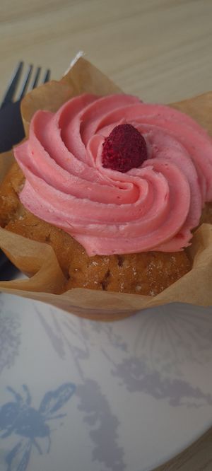 Almond & raspberry muffin  at Busy Beans Cafe in Redhill