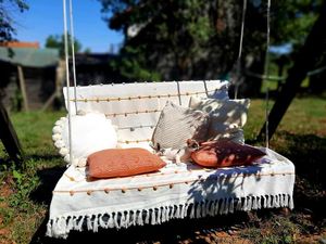 Swing bench at Lotus Mellow in Valea Lunga