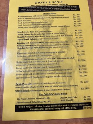 Breakfast menu (Dec 2022)- also a page of drinks on the back   at Honey and Spice in Pushkar