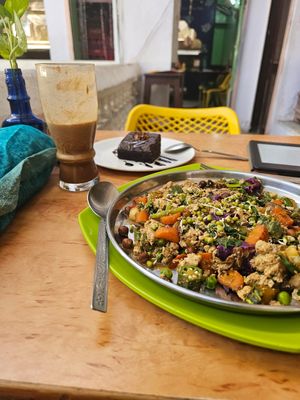 Tofu scramble, ice coffee chocolate and coconut shake and brownie at Honey and Spice in Pushkar