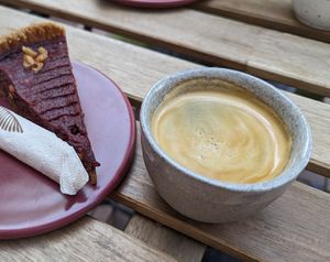 Raspberry cake and an Americano at A99 in Budapest