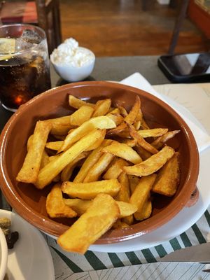 Cuidado que las patatas las sirven con mayonesa con huevo   at Can Shelabi Restaurant in Cadaques