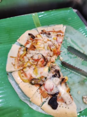 What a shame this pizza wasn't vegan. at Quan Am Lien Tho in Vung Tau