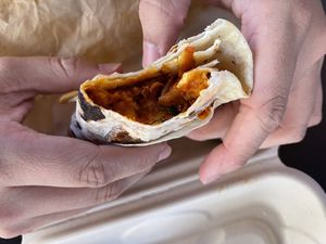 inside burrito for casa de luz  at That Good Good Market in San Diego