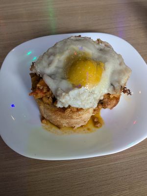 Pão com ovo especial at Caneca Café in Sao Paulo