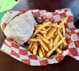 Chicken sandwich with fries   at Dope Vegan in West Palm Beach