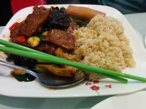 Lunch combo, beef with black bean sauce, brown rice, spring roll at Nature Vegetarian Restaurant in Oakland