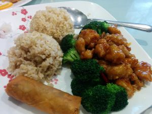 Lunch combo, General Tso's chicken with broccoli, brown rice, spring roll, soup of the day included. Very tasty, well seasoned, not greasy. at Nature Vegetarian Restaurant in Oakland